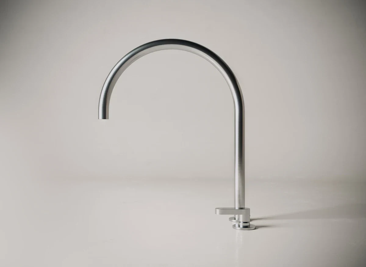 Sleek modern stainless steel kitchen faucet with minimalist design.