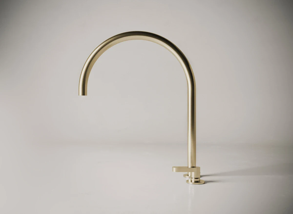 Polished gold modern kitchen faucet for luxury home kitchen decor.